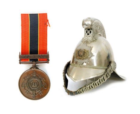 A Merryweather pattern National Fire Service nickel officers fireman's helmet, height 24cm, together with a 10 years service 