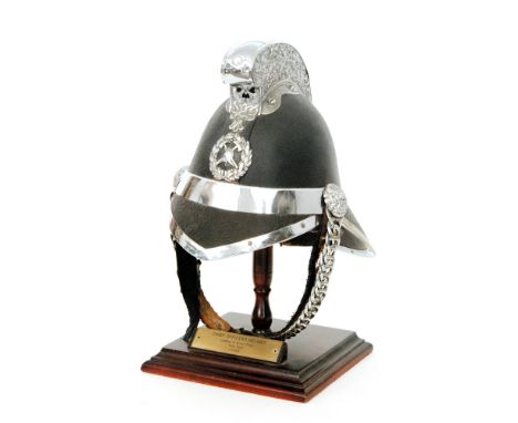 A 1920s Scottish chief officer's leather and silver plated helmet, with chin strap and liner, oak leaf comb, by Jas Hendrey G