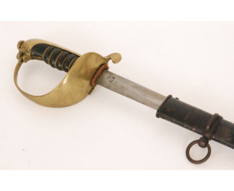 A late 19th and early 20th Century naval sword with lion brass hilt and guard with metal scabbard, 77cm blade. 