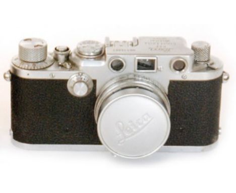 A Leica IIIf 35mm camera No 526061 with Summitar f =5cm lens No 810982 also a spare Summacron lens f=28cm 1.56, a Leica manua