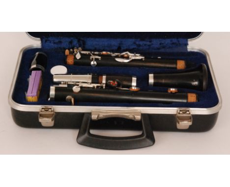 A Boosey and Hawkes five piece ebony clarinet with nickel fittings, cased.