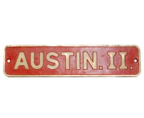 An Austin II locomotive plate, 0-6-0ST, length 71.5cm, together with two black and white photographs of the engine.Purchased 