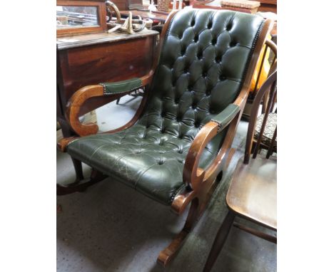 A modern leather button back rocking chair 