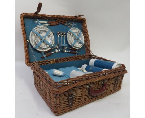 A vintage Brexton picnic hamper in original wicker basket 