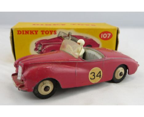 Dinky - 107 Sunbeam Alpine Sport, deep pink (as colour marked on box), grey interior, white driver, in original box  Conditio