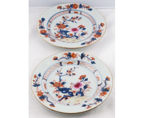 A pair of Chinese cabinet plates, decorated with flowers &amp; trees, 23cm diameter