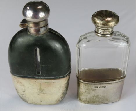 A silver mounted glass hip flask, by Mappin & Webb, London 1904, with pull off cup base, screw cap, 12.5 cm high; & a metal m