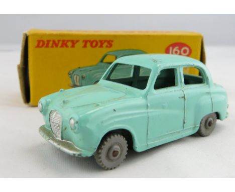 Dinky - 160 Austin A30 Saloon, turquoise (as colour marked on box), light grey wheels, in original box  Condition - car with 
