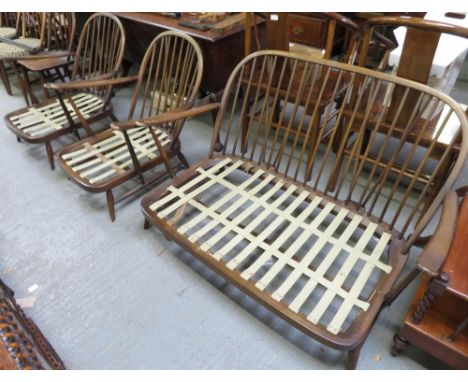 An Ercol sofa frame, along with two Ercol armchair frames 