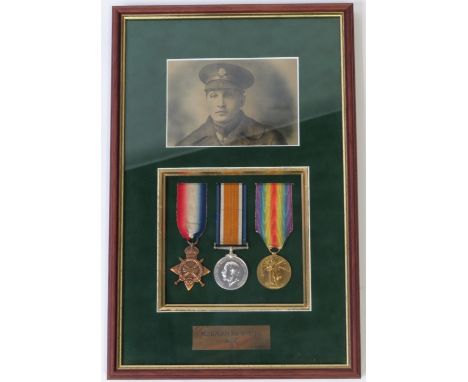 A framed trio of WWI medals awarded to Pte W. Miles, army service corps