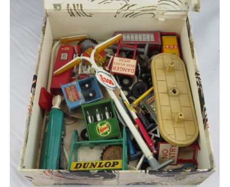 A Britains diecast Castrol oil stand; an unmarked Essolube stand; various diecast & plastic road signs; roadwork signs; Dinky
