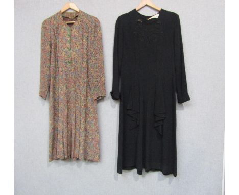 Two 1940's dresses including a black crepe dress, "Mary Garden" wartime label and brown crepe with an orange, green, blue and