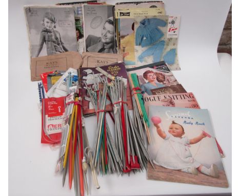 A quantity of knitting needles, a selection of 1950's and 60's knitting patterns, "Family Journal" newspaper cutting 1915, 19