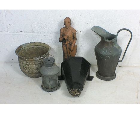A collection of metal garden ornaments including a vintage hopper, jug pot,etc