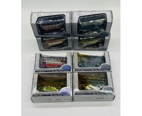 A collection of eight boxed Gilbow "War Time Buses" die-cast models including AEC Regal US Army, AEC STL Class London Transpo