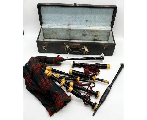 A vintage set of bagpipes with chanter named to Peter Henderson with engraved date 1940 to mouthpiece, Glasgow in travel case