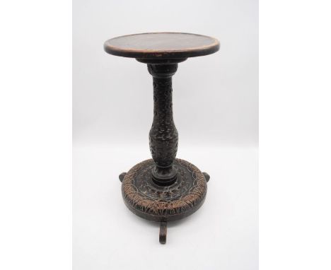 A circular occasional table on carved tripod base - height 53cm, diameter 28cm