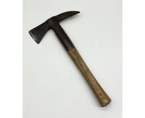 A Brades wooden handled fire axe with broad arrow mark dated 1953 H.98