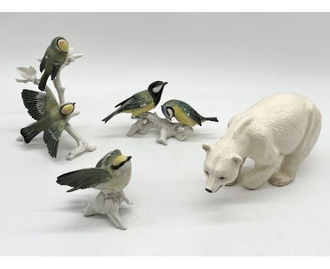 Three Karl Ens porcelain birds including pair of goldcrests, tits and finches along with a Melba Ware polar bear