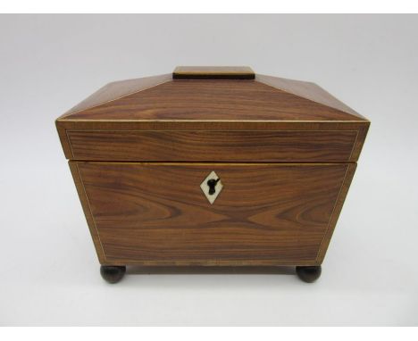 A small sarcophagus shaped tea caddy with boxwood stringing