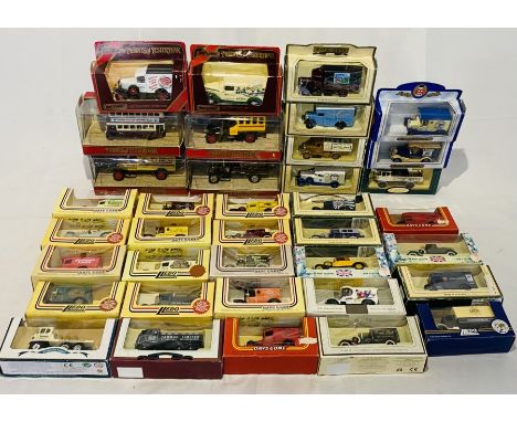 A collection of boxed die-cast vehicles including Matchbox Models of Yesteryear, Lledo Days Gone, Oxford Die-Cast, Royal Mail