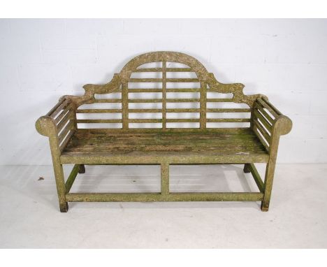 A weathered wooden Lutyens style garden bench - length 166cm, depth 58cm, height 105cm
