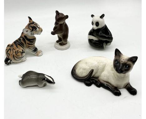 A collection of ceramic animals including Beswick Siamese Cat and USSR tiger, badger and panda etc. 