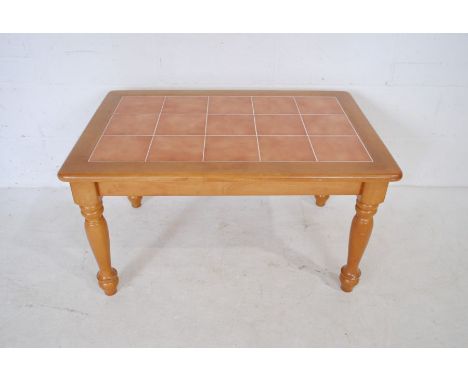 A mid century tile top coffee table - length 89cm, depth 60cm, height 49cm