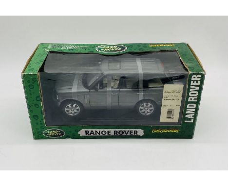 A boxed Ertl Collectibles Land Rover die-cast (1:16 Scale) Range Rover