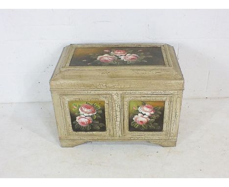 A crackle glaze painted trunk with floral decoration. 70cm x 43cm, height 55cm