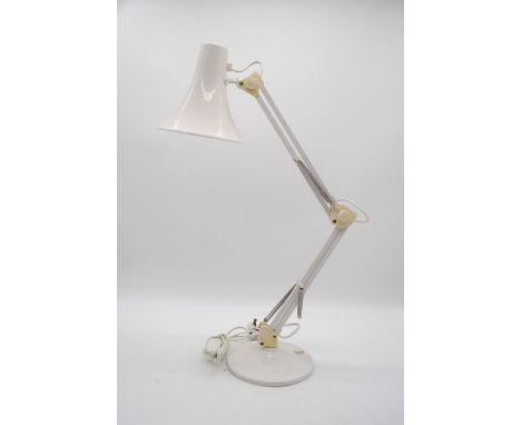 A white Anglepoise style lamp