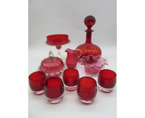 A collection of cranberry and ruby glass