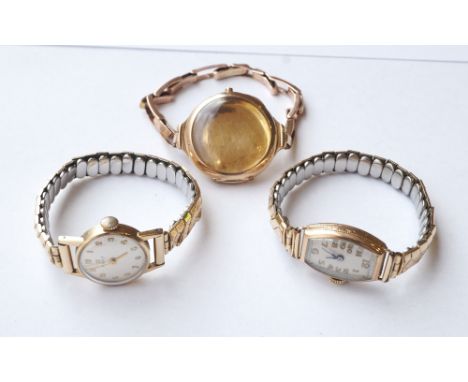 TWO LADIES NINE CARAT GOLD CASED WRISTWATCHES
one by Tissot, both dials set with Arabic numerals and both on expanding bracel
