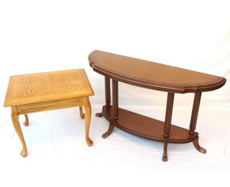 MAHOGANY AND CROSSBANDED CONSOLE TABLE
of shaped outline with a top supported by four turned columns to an undertier, standin