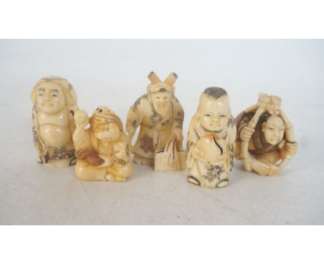 FIVE CARVED BONE NETSUKE
of people, 4.3cm to 5.4cm high 