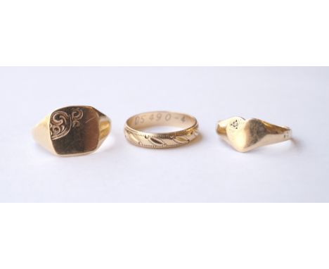 THREE NINE CARAT GOLD RINGS
of various design, one of heart shape with inset diamond, ring sizes M M-N and R (3)