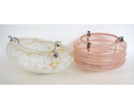TWO 1930's GLASS CEILING LIGHT SHADES
one with rose pink ribbed decoration and hanging chains, 30cm wide, the other opaque gl