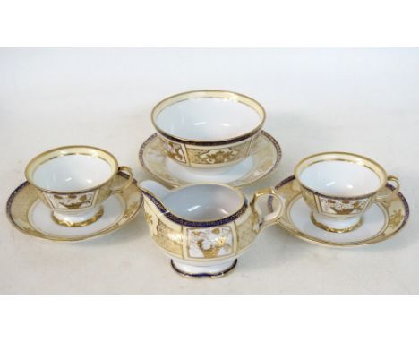 NORITAKE PART TEA SERVICE
with gilt decoration, comprising nine cups; eleven saucers; six side plates; sugar basin and milk j