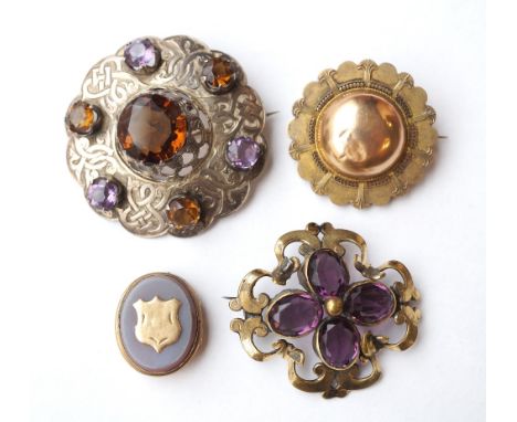 VICTORIAN FIFTEEN CARAT GOLD PORTRAIT LOCKET BROOCH
of shaped design, 3.5cm diameter; period plaid brooch set with cairngorms