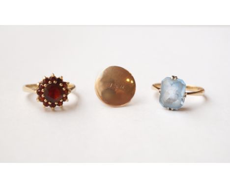 GARNET DRESS RING
set in nine carat gold, ring size L, aquamarine dress ring also set in nine carat gold and ring size L, and