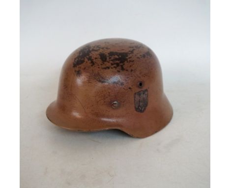 WWII GERMAN M35 STEEL HELMET
with post-war applied copy double Army decals and paintwork, later liner, viewing recommended
