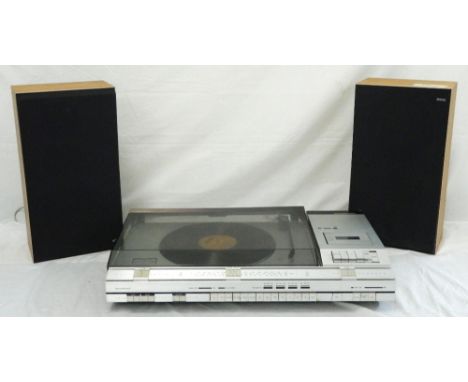 BANG & OLUFSEN BEOCENTER 4600 MUSIC CENTRE
with a record deck, cassette recorder and three band tuner with a pair of Beovox S