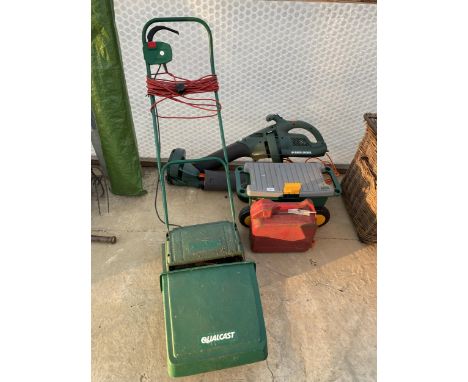 AN ASSORTMENT OF GARDEN TOOLS TO INCLUDE A QUALCAST LAWN MOWER, A BLACK AND DECKER LEAF BLOWER AND A FUEL CAN ETC 