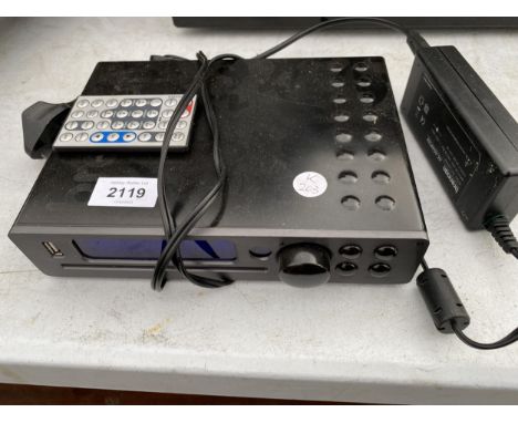 A BRENNAN JB7 CD STORER AND REMOTE CONTROL 