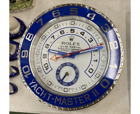 A DEALERS WALL CLOCK, DIAMETER 34CM 