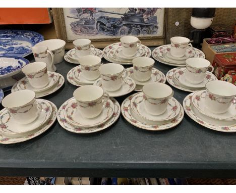 A VINTAGE ENGLISH CHINA LARGE QUANTITY OF TEAWARE TO INCLUDE CUPS, SAUCERS, SIDE PLATES, CREAM JUG AND A LARGE SUGAR BASIN 