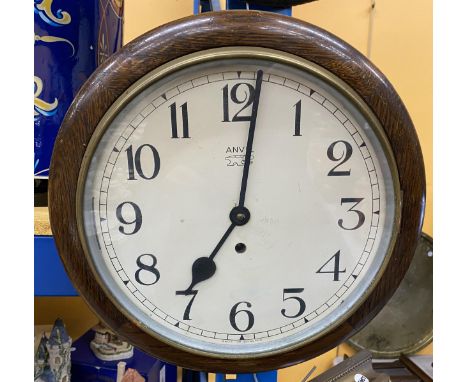 A VINTAGE ANVIL ENGLISH RAILWAY CLOCK WITH KEY &amp; PENDULUM 