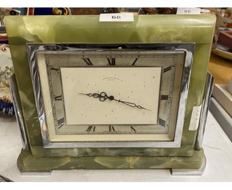 AN ART DECO STYLE ONYX AND CHROME MANTLE CLOCK BY H.PIDDUCK &amp; SONS, HEIGHT 21CM 