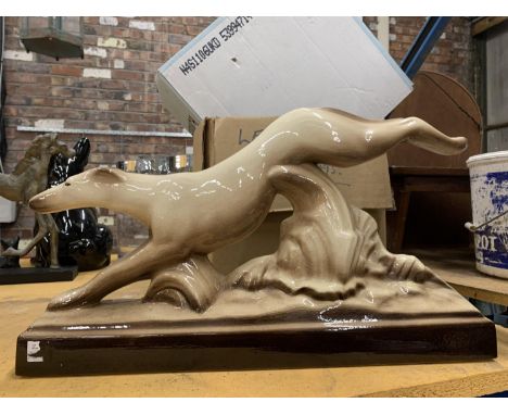 A LARGE CERAMIC GREYHOUND LENGTH 43CM 