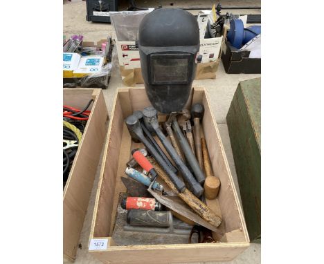 AN ASSORTMENT OF TOOLS TO INCLUDE A WELDING MASK, HAMMERS AND TROWELS ETC 
